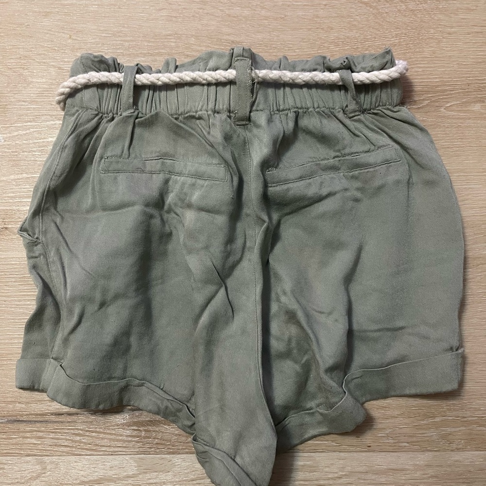 The perfect color green. Worn a few times. Size S